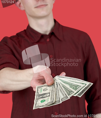 Image of Man with pack of dollars