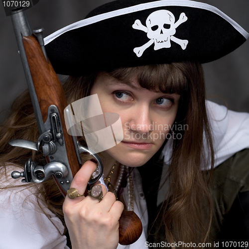 Image of Girl - pirate with pistol in hand