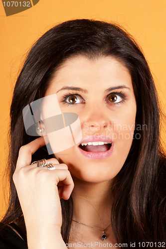 Image of Young woman thinking positive