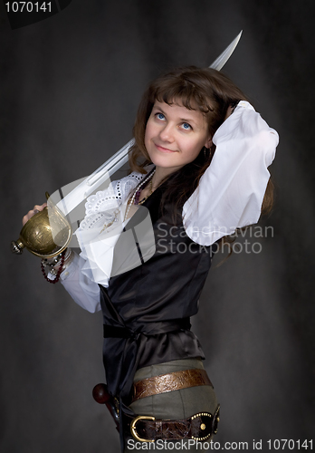 Image of Pirate - girl with a sabre in hand on a black