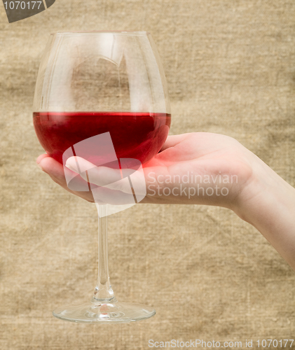 Image of Wineglass on hand