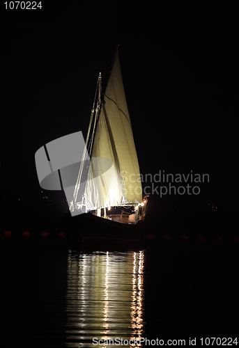 Image of Arab dhow at night