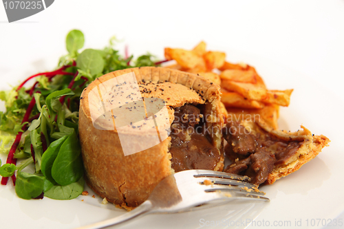 Image of Steak pie salad and fries