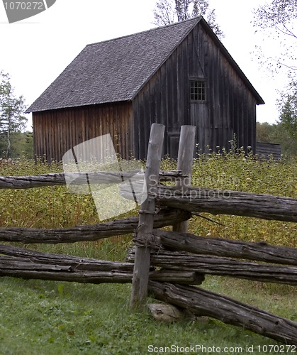 Image of Fence post and Barn