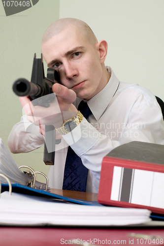 Image of Accountant armed with a rifle