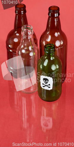 Image of Four glasses bottle