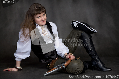 Image of Girl with pistol and pirate hat