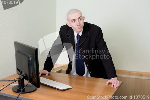 Image of Director in a jacket at office