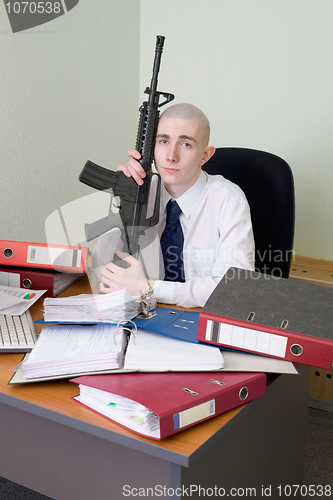 Image of Accountant armed with a rifle