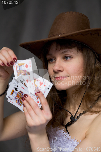 Image of Portrait girl with a playing-cards