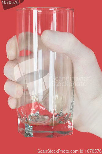 Image of Glass of water on hand in glove