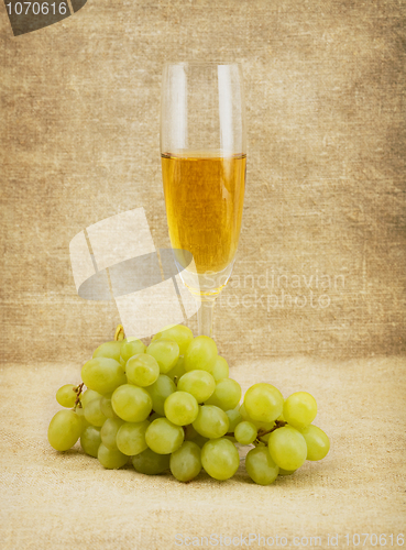 Image of Goblet and grapes