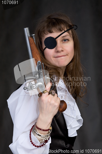 Image of Girl - pirate with pistol in hand and eye patch