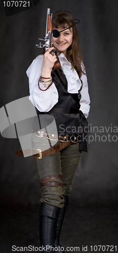 Image of Girl - pirate with pistol in hand and eye patch