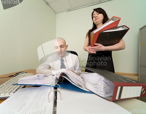 Image of Bookkeeper and the secretary on a workplace