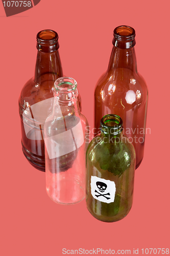 Image of Four glasses bottle