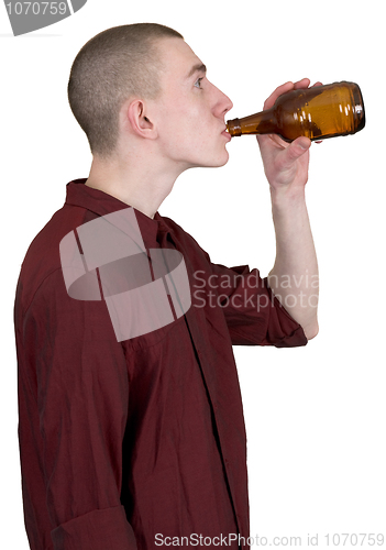Image of Young man with brown bottle