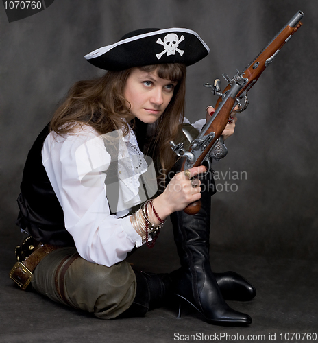 Image of Girl - pirate with two pistol in hands