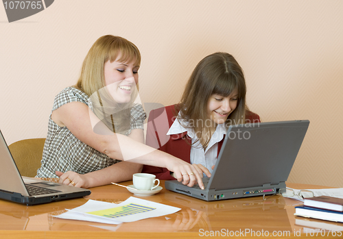 Image of Girls work sitting at a table
