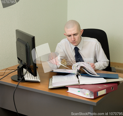 Image of Bookkeeper on a workplace at office