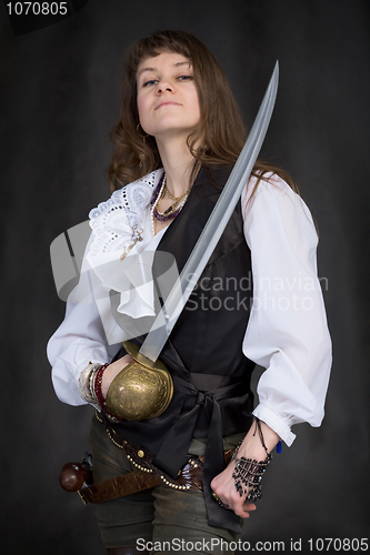 Image of The girl - pirate with a sabre in hands