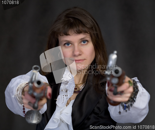 Image of Girl - pirate with two ancient pistols in hands