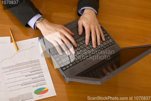 Image of Business people planning on the laptop