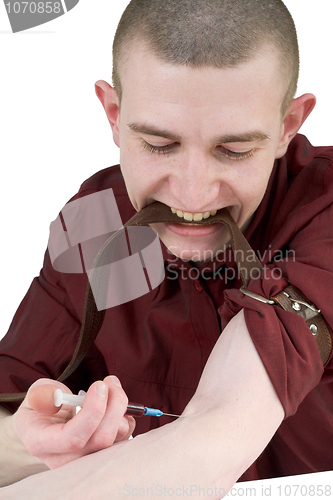 Image of Young man to give an injection himself