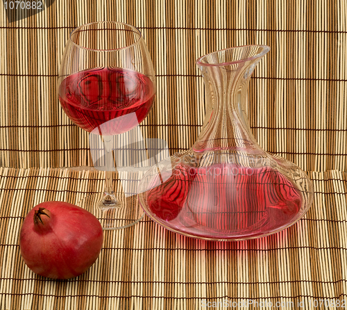 Image of Stil life with decanter, goblet and pomegranate
