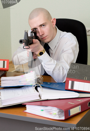 Image of Accountant armed with a rifle