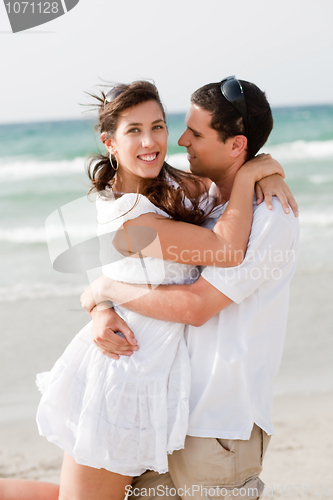 Image of love couple on the beach