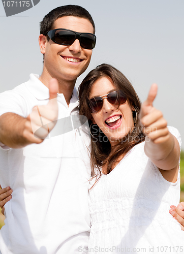 Image of Young Couple Hugging and smile