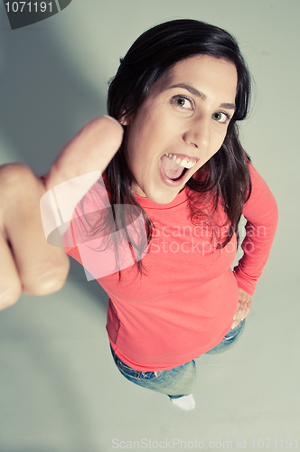 Image of Happy Young Lady Showing Thumb'S Up