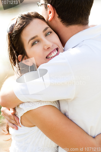 Image of Closeup Portrait Of A beautiful Couple Hugging