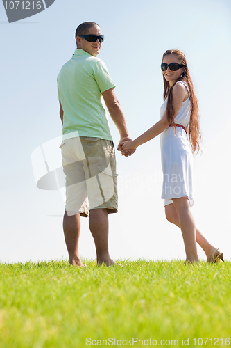 Image of young couple walk