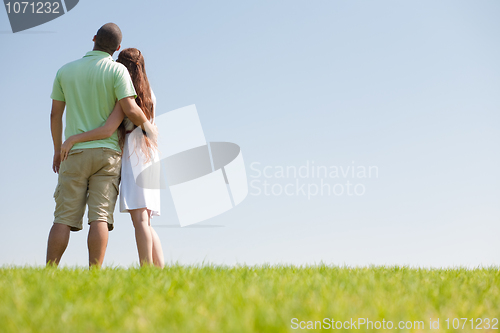 Image of young couple hug