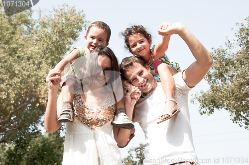 Image of family in the park