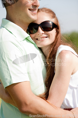 Image of Closeup Portrait Of A beautiful Couple Hugging