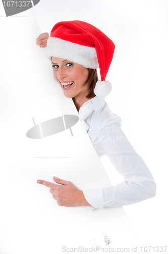 Image of Female Santa pointing down at blank billboard