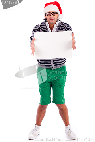 Image of playful santa boy with a blank board