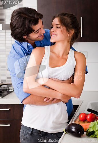 Image of husband hold her wife and about to kiss