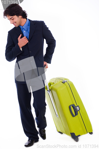 Image of Corporate man looking down with the luggage