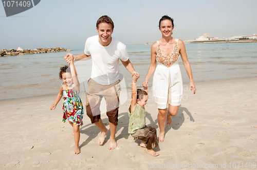 Image of Family  in the beach