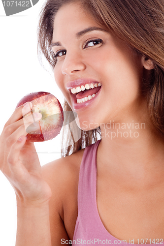 Image of portrait of a healthy girl smiling with apple