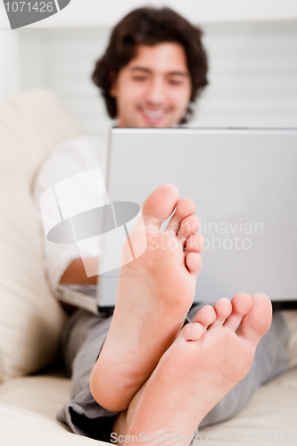 Image of isolated grey open laptop man typing