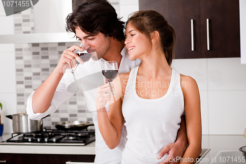 Image of honeymoon couple drinking wine