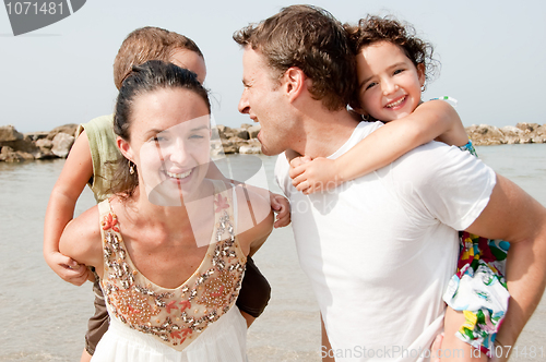 Image of family in the beach