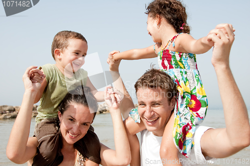 Image of family in the beach