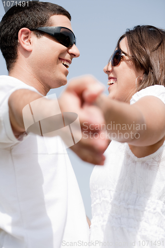 Image of Portrait of couple holding hands