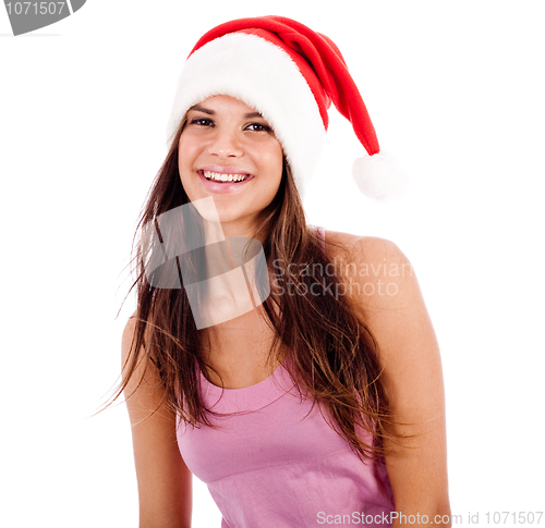 Image of beautiful young women wearing santa's hat